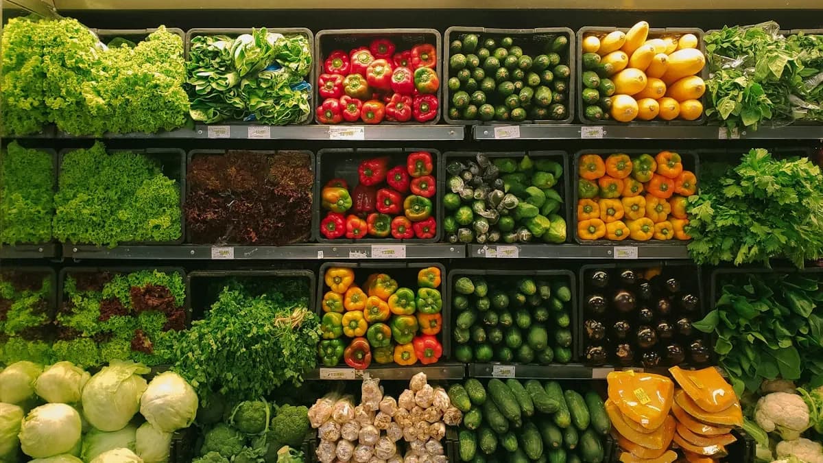 Fresh fruit and supermarket produce shelves